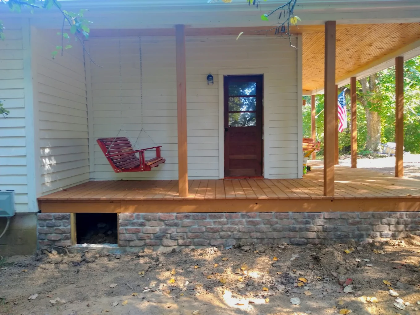 New porch with brick foundation